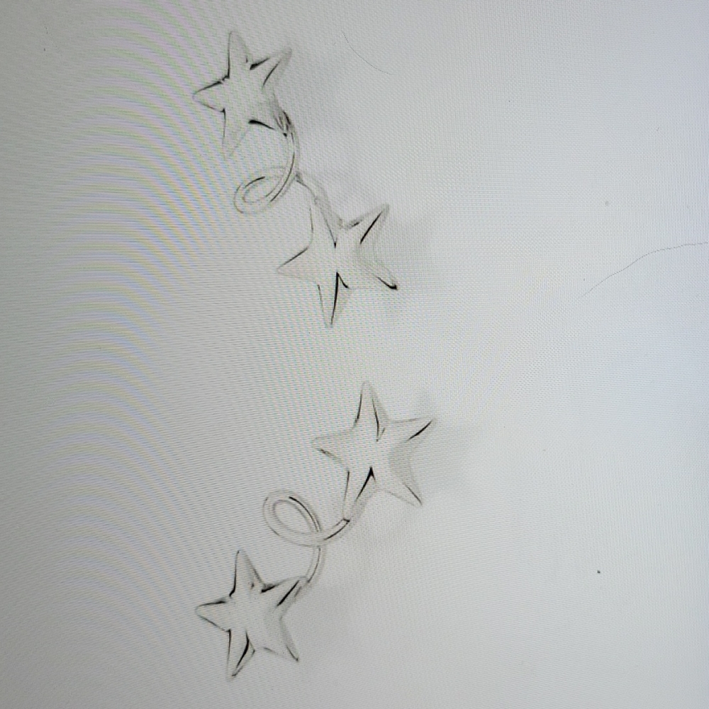 Platinum twisted stars earrings